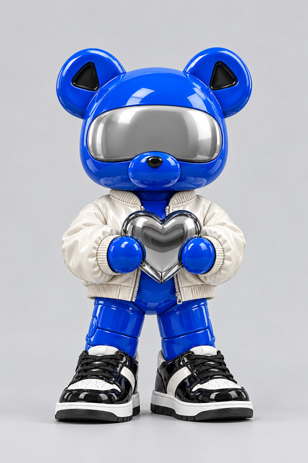 Indigo, a cobalt bear with a silver visor and white bomber, holds a chrome heart.